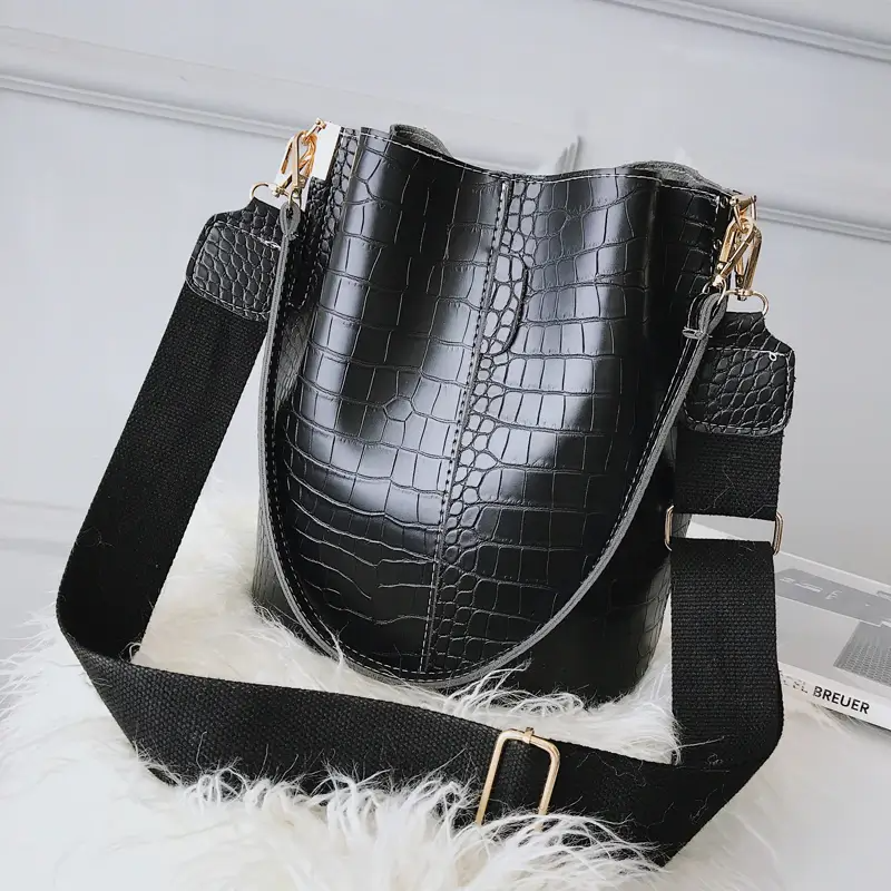 aminah branded webbing strap bucket bolsa